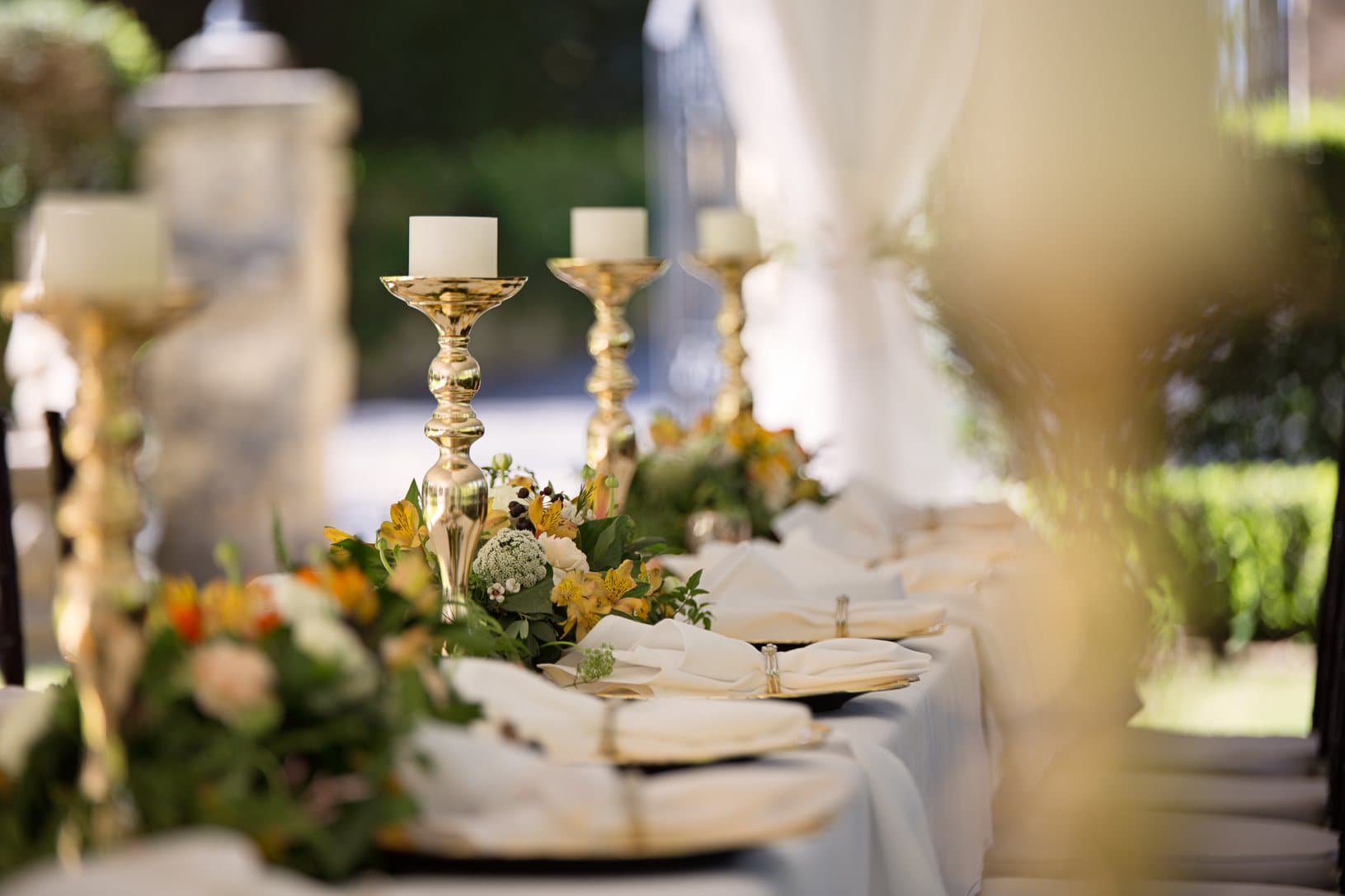 A candlelit tablescape set for an event